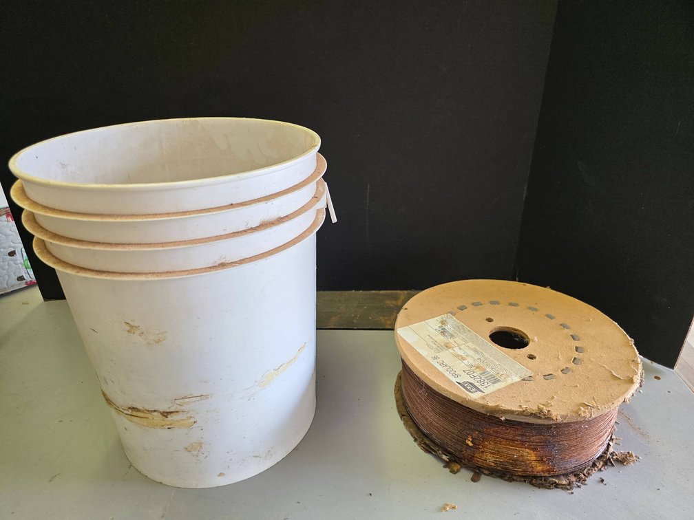 Plastic Bucket of Nails and ESAB Spoolarc 86 Welding Wire Spool