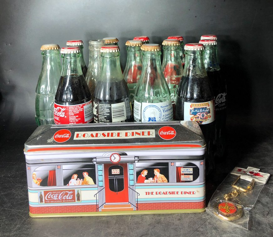 14 Coca-Cola Bottles, Collector Tin, and Keychain