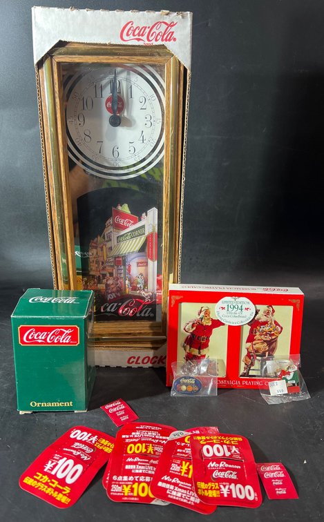 Coca-Cola Collectibles Lot Featuring Clock, Cards, Ornament, and Tokens