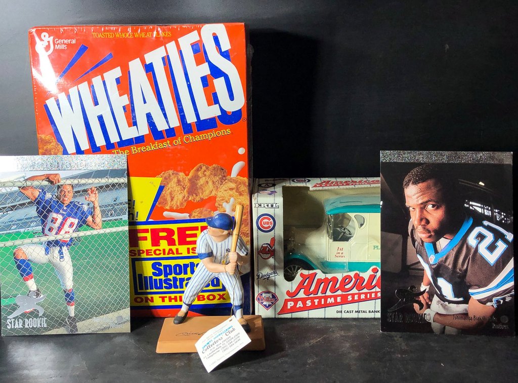 Sports Memorabilia Lot Featuring Baseball and Football Collectibles