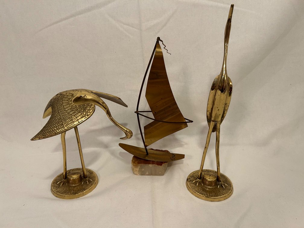BRASS HERONS