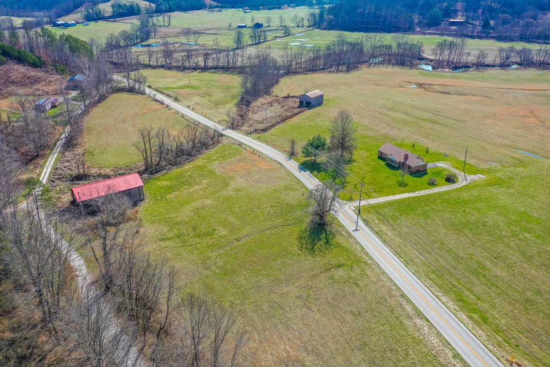 Tract #1: 54 +/- Acres with House & 2 Barns