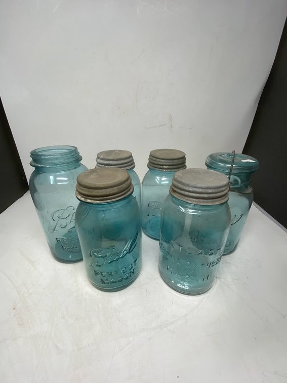 6- Blue Mason Jars 4- Zinck lids and 1 Bicentennial Edition 