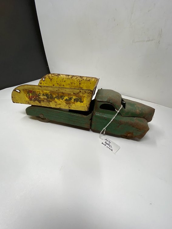Early Buddy's Sand and Gravel Pressed Steel Dump truck green and yellow, missing a wheel 
