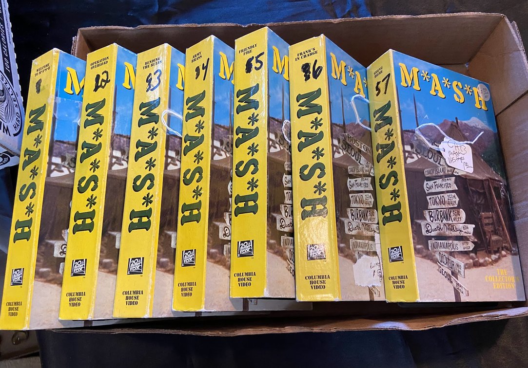 Group of M*A*S*H VHS tapes.