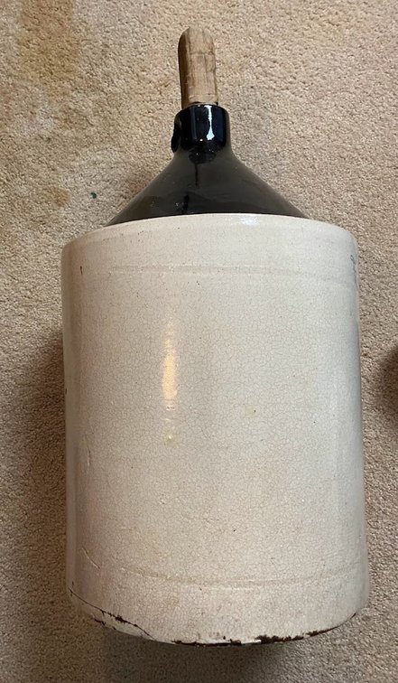 Brown and White Crock Jug