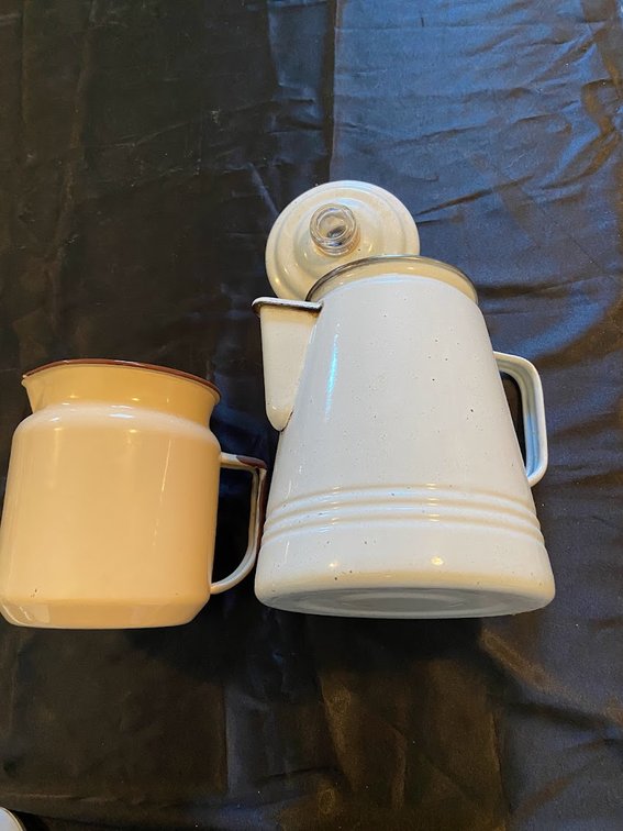Enamelware pitcher and teapot.