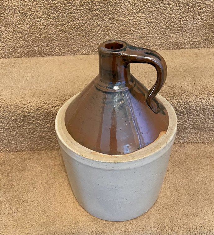 Brown and tan stoneware jug.