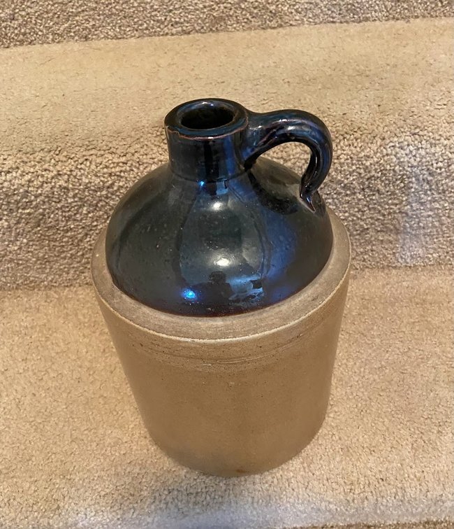 Brown and tan stoneware jug.