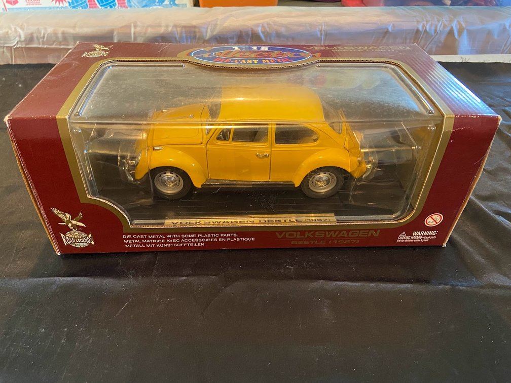 Volkswagen Beetle die-cast metal model.