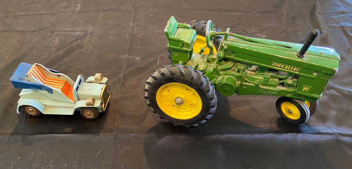 John Deere tractor model and convertible car model.