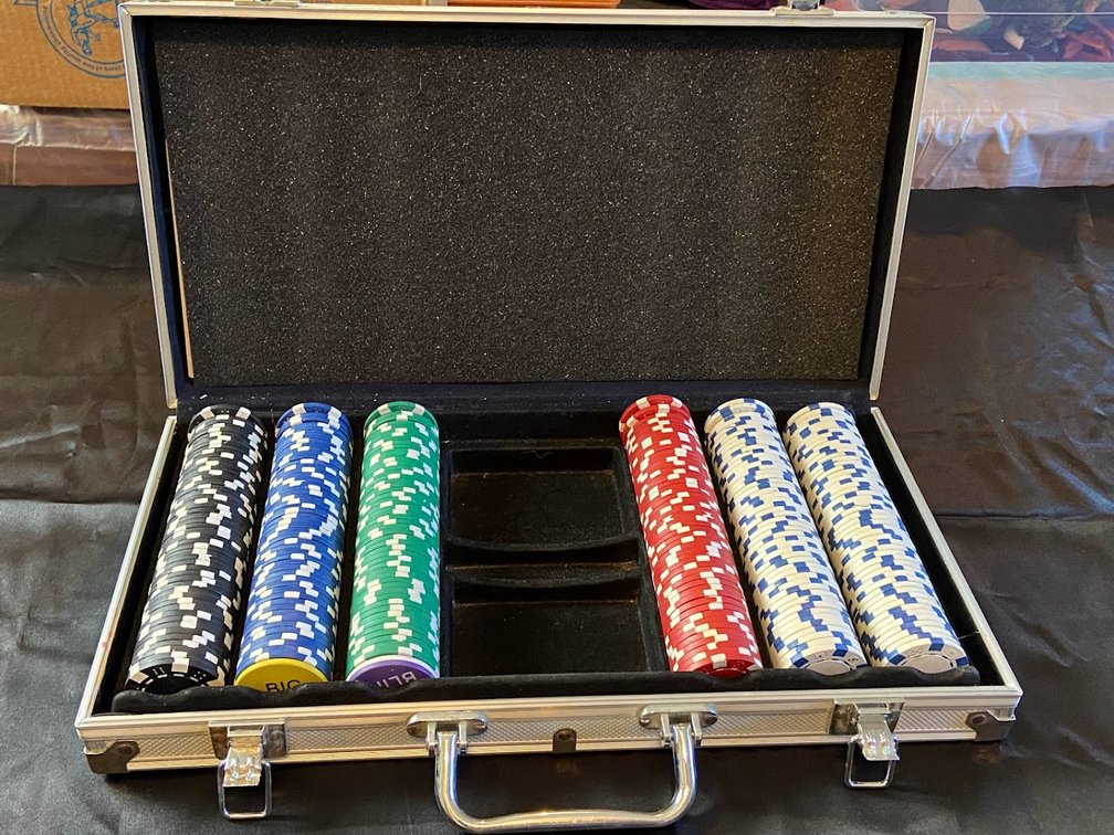 Poker chips in a case.