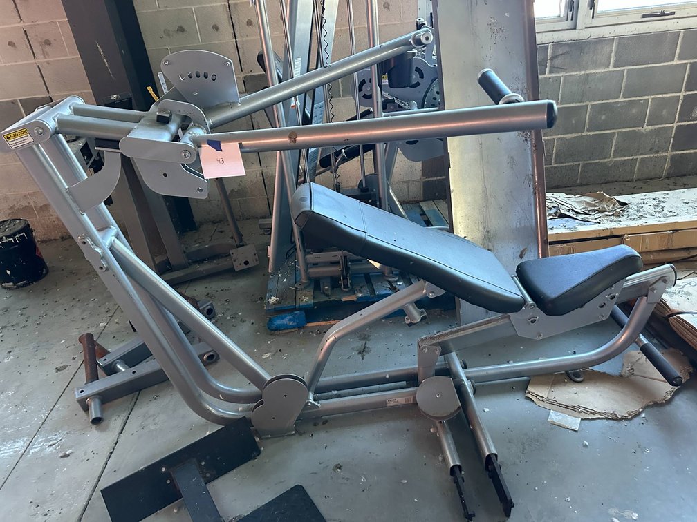 Cybex Strength Training Equipment Including Bench and Lat Pulldown Machine