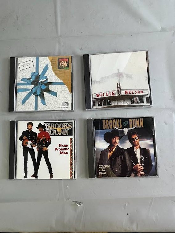 Four Country Music CDs Featuring Willie Nelson and Brooks & Dunn
