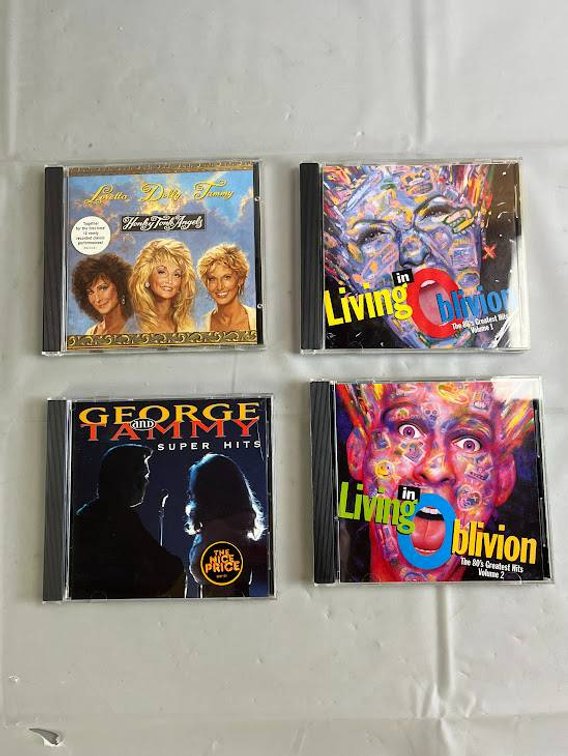 4 CDs: Loretta, Dolly, & Tammy, George & Tammy, and Living in Oblivion Vol. 1 & 2