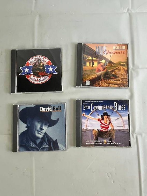 4 Country Music CDs Featuring Confederate Railroad, Mark Chesnutt, k.d. lang, and David Ball