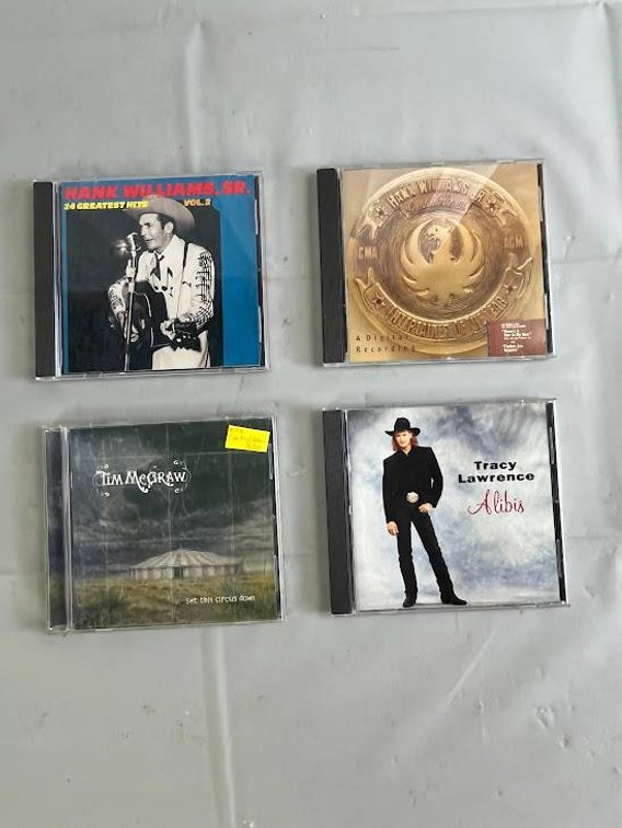 4 Country Music CDs by Hank Williams Sr., Hank Williams Jr., Tim McGraw & Tracy Lawrence