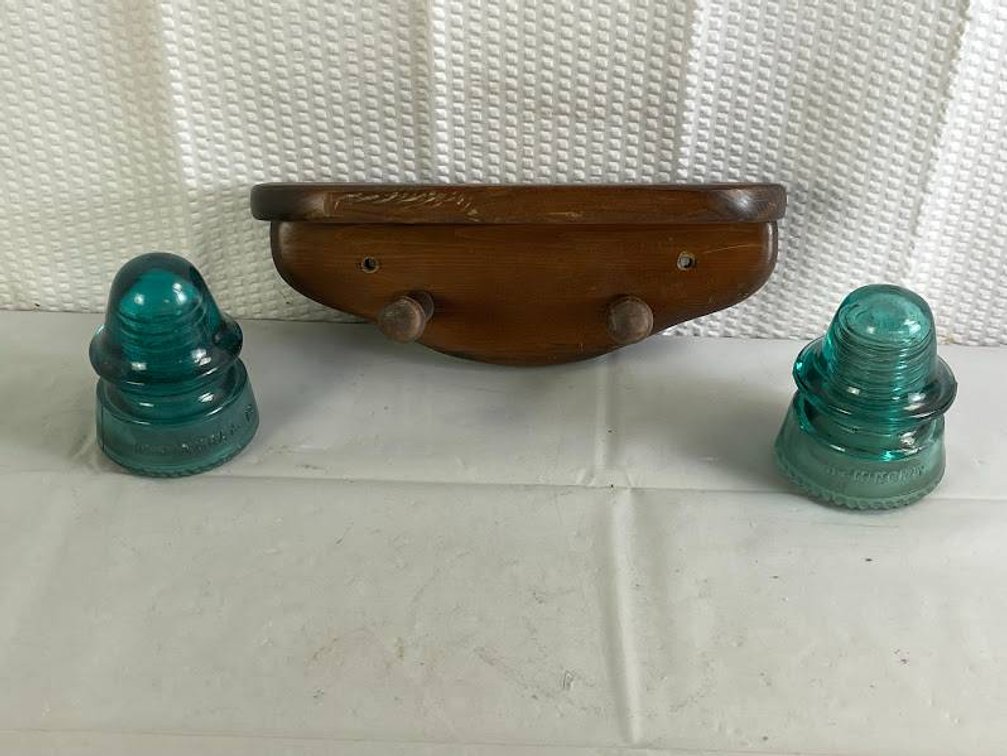 Teal Hemingray Glass Insulators with Wood Wall Rack