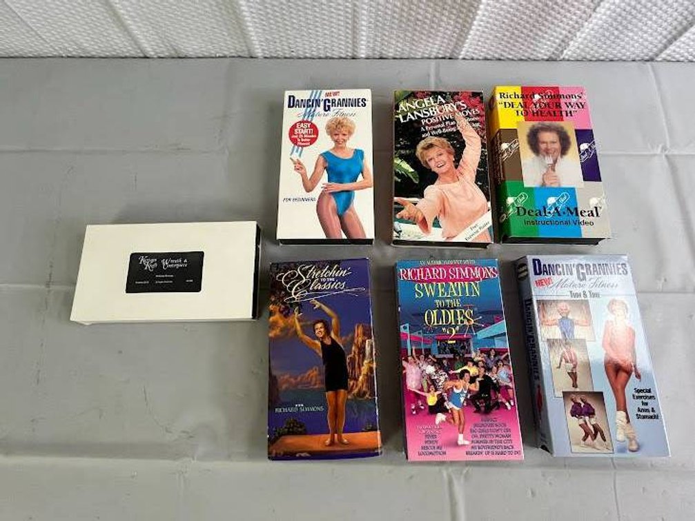 7 VHS Tapes Including Richard Simmons, Angela Lansbury, and Crafts Videos