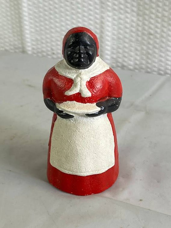 Cast Iron Coin Bank of Woman in Red Dress Holding Bowl