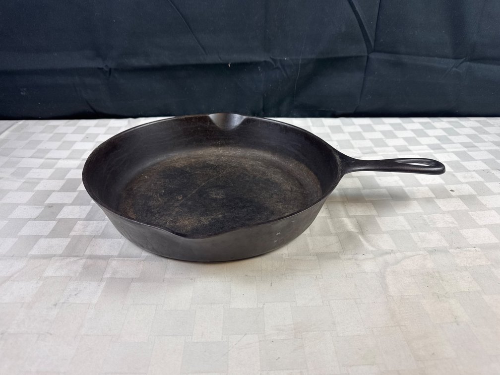 Cast Iron Skillet with Pour Spouts and Marking on Handle