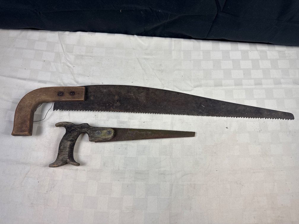 Two Hand Saws with Wooden and Metal Handles