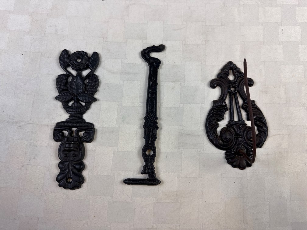 Three Decorative Cast Iron Hardware Pieces