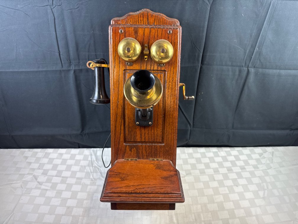 Wall-Mounted Wooden Telephone with Brass Accents and Push-Button Keypad