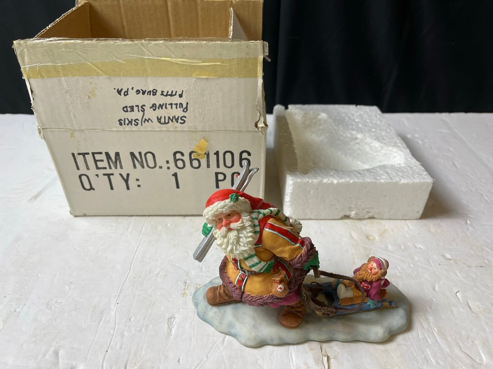 Santa's Antics Pulling Sled Figurine by Wenzel