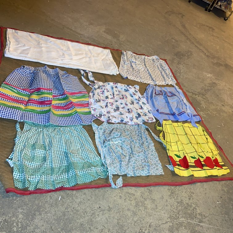 Seven Vintage Aprons and Tablecloth Assortment