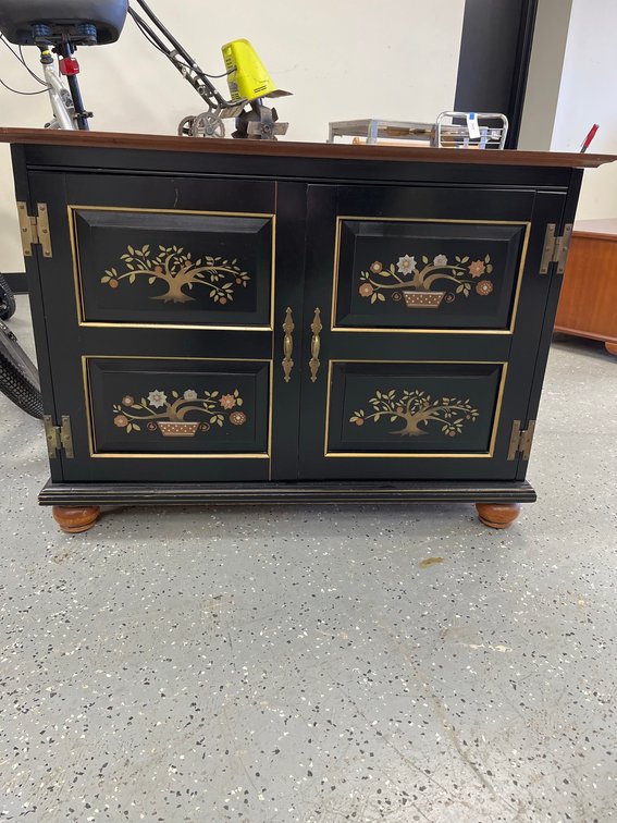 Black Painted Wood Cabinet With Floral Panels