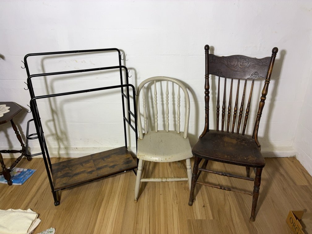Two Wooden Chairs and Metal Rack