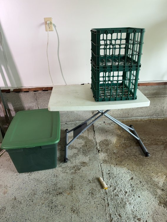 Folding Table With 2 Green Plastic Crates