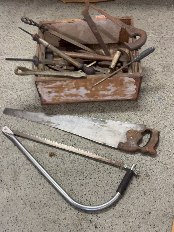 Hand Tools With Saws In Wood Crate