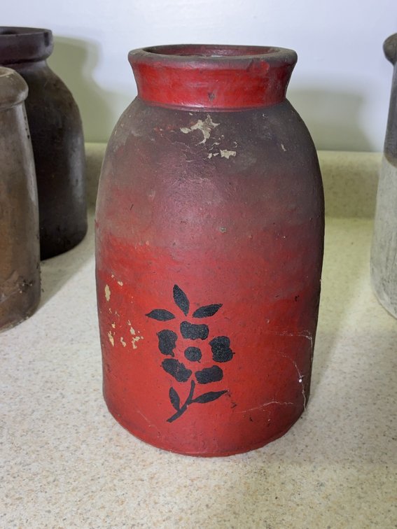 Red Stoneware Crock with Black Floral Motif