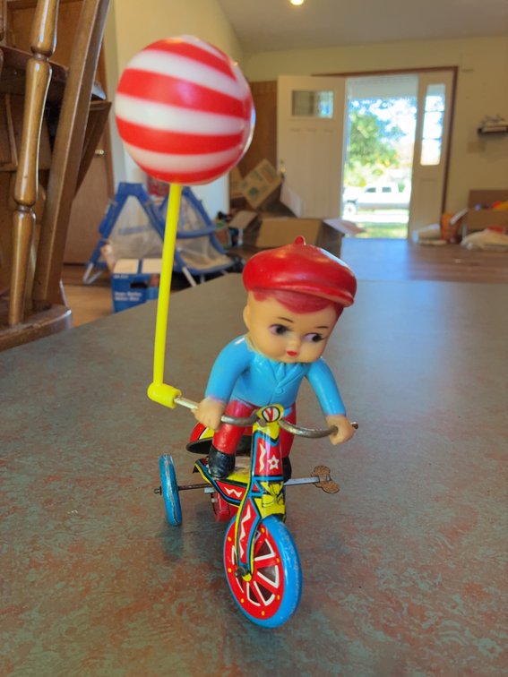 Tin Wind-Up Tricycle Toy Boy With Balloon
