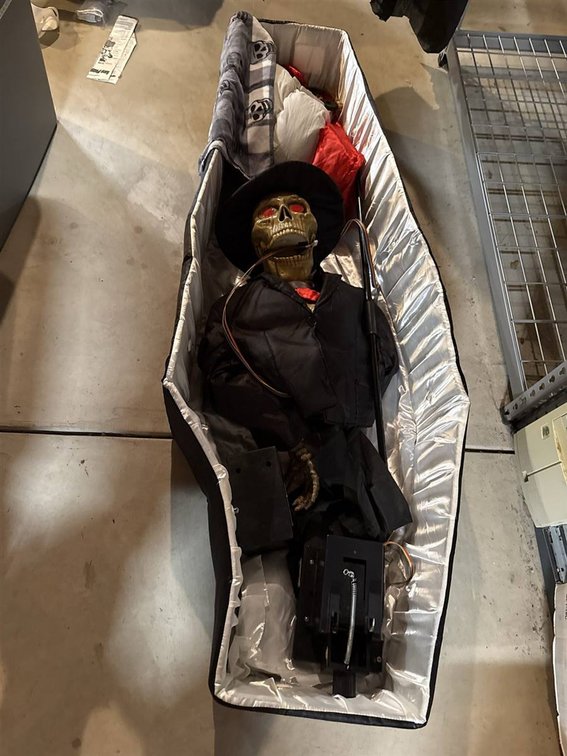 Animated Skeleton Prop in Coffin with Blanket