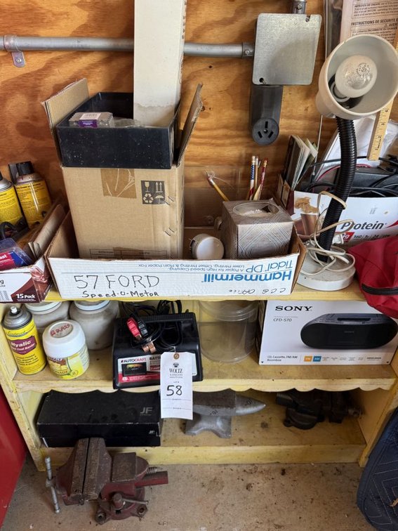 Yellow Wooden Cabinet With Contents. Small Anvil, Vise, Battery Charger, Misc