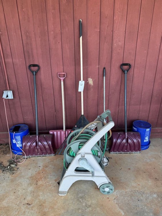 Hose and Reel, (2) Rakes, (3) Snow Shovels, (2) Buckets
