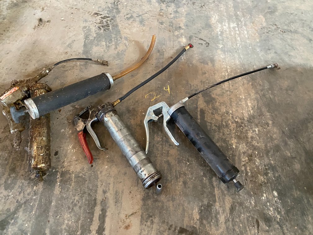 GREASE GUNS