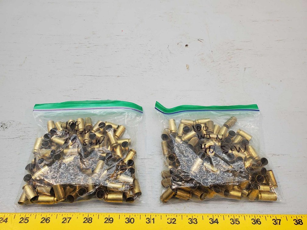 (I-12) [200] .40 CAL WIN RELOADS, CLEAN - FIRED ONCE