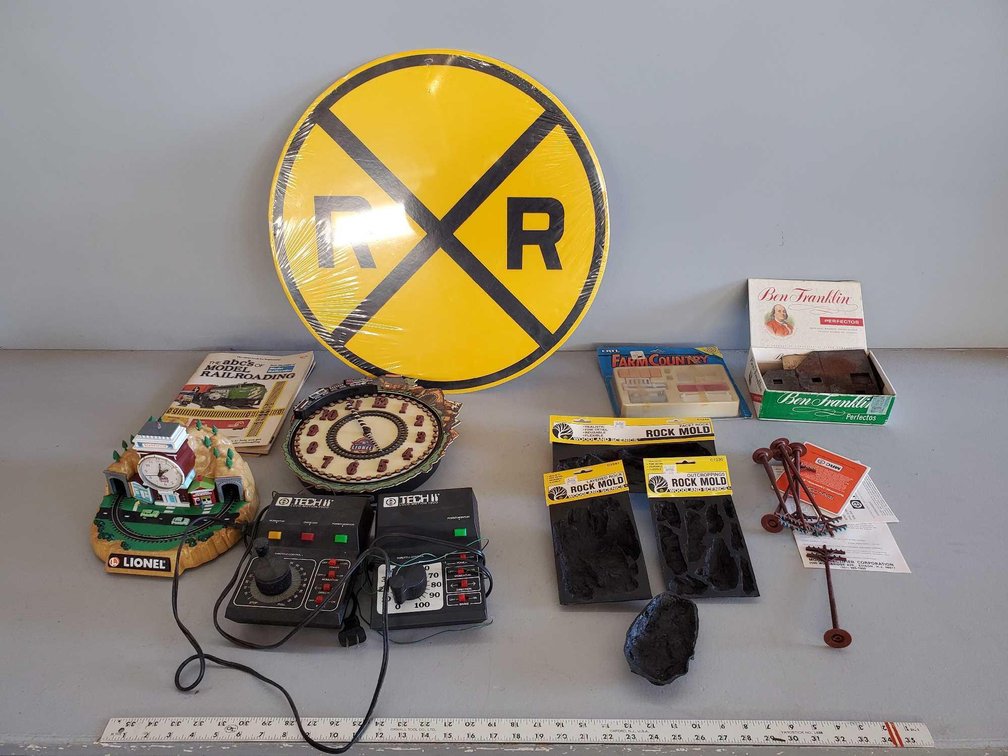 (I-39) TECH II CONTROLLERS, TRAIN CLOCKS, ROCK MOLDS, CARDBOARD RAILROAD CROSSING SIGN, AND MISC