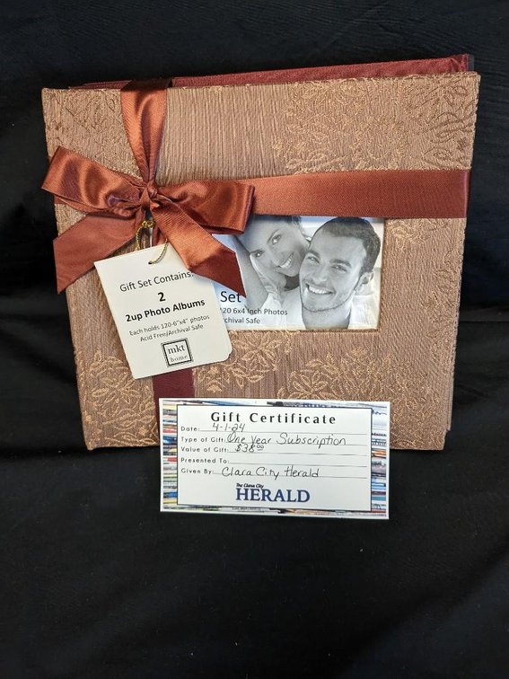 CLARA CITY HERALD 1 YEAR SUBSCRIPTION AND PHOTO ALBUM