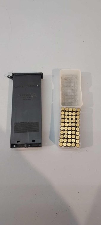 (I-2320) [50] ROUNDS OF .22 SHELLS AND SHELL SHUCKER