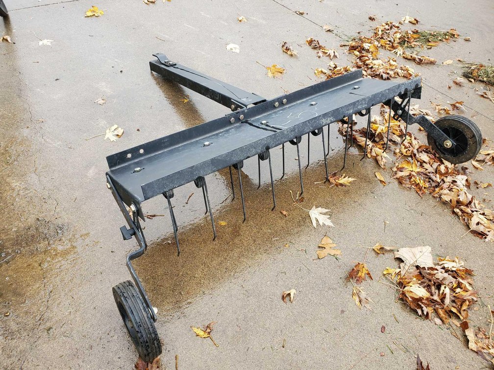 (I-5) (LOCATED IN MORRIS, MN) LAWN DE-THATCHER (FOR MORE INFO AND LOCATION CALL NEIL @ 612-804-4142)