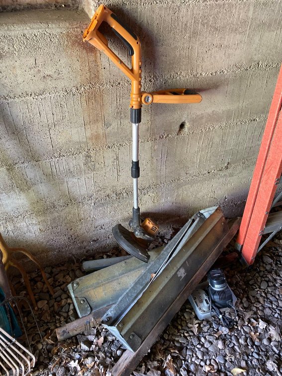[2] ALUMINUM SAW HORSES AND WORX WEED WHIP W/BATTERIES & CHARGER