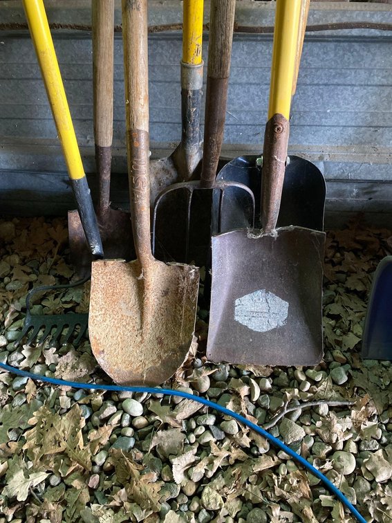 [2] SPADES, METAL RAKE, [3] SHOVELS, AND PITCHFORK