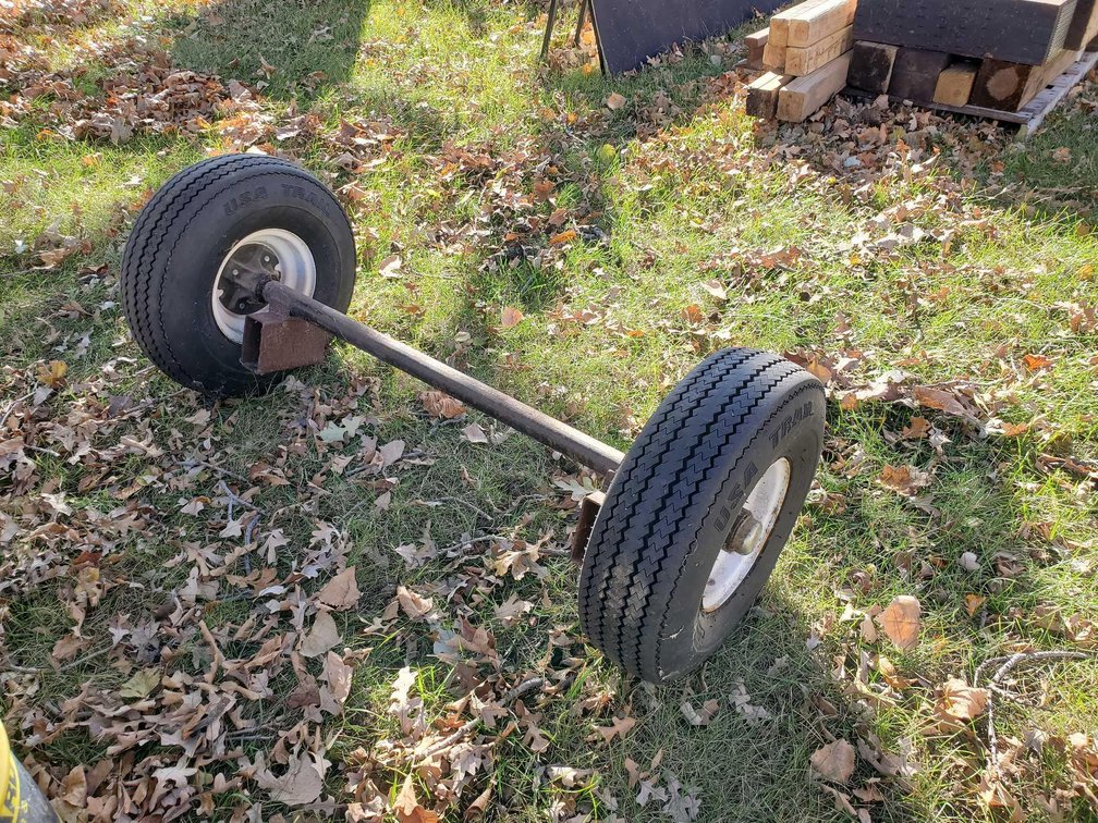 AXLE WITH [2] TIRES & RIMS