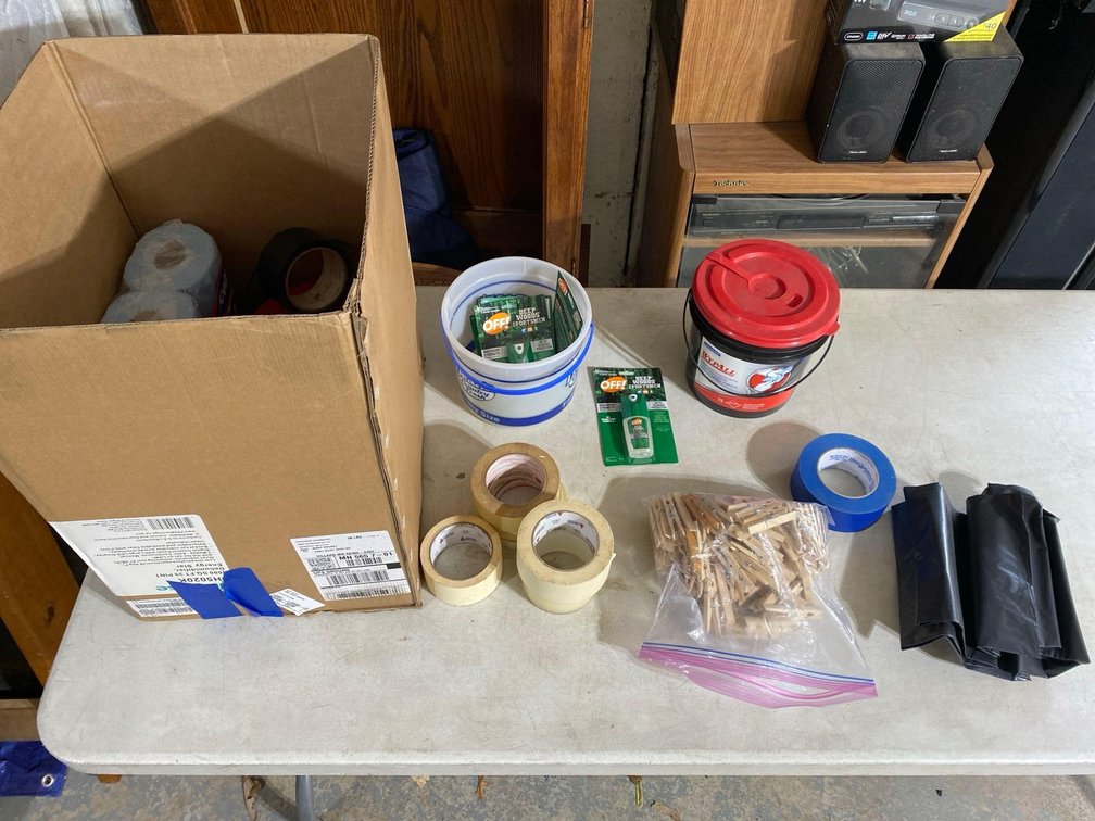 ASSORTMENT OF TAPE, CLOTHES PINS, AND OTHER ITEMS