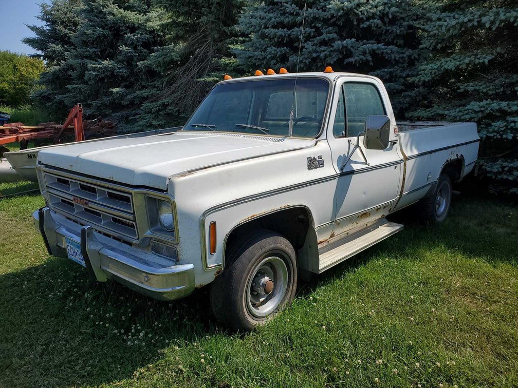 (I-122B) (TITLE) 1976 GMC HIGH SIERRA, 61,857 MILES SHOWING, MANUAL TRANSMISSION VIN: TKJ146F717210